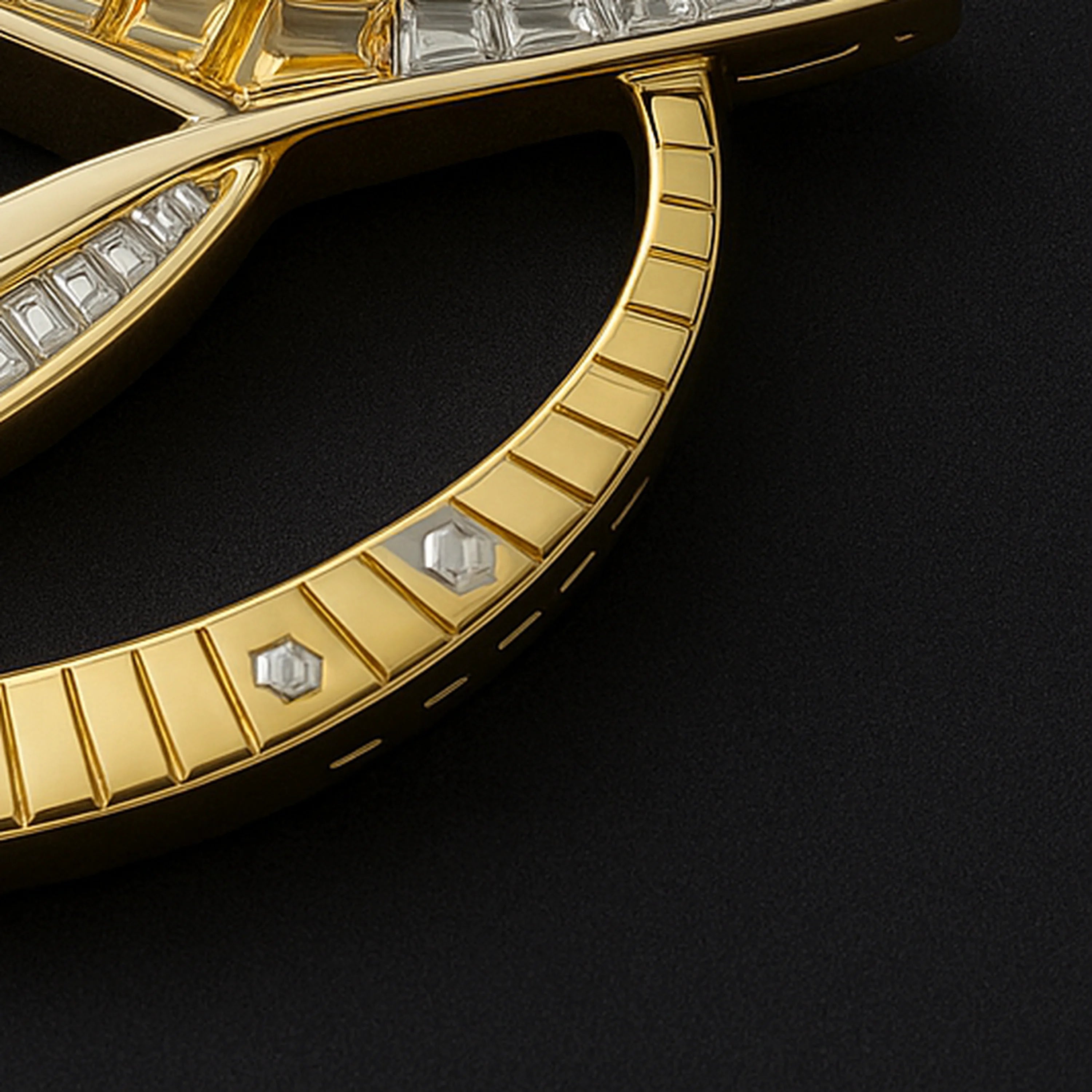 Redbutan Sigil Velocity Monogram High Jewel Pendant original design Macro detail of a RedButan 18k yellow-gold curve with stepped fluting and small diamond accents on black