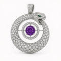 RedButan high jewel ouroboros serpent pendant with pavé diamonds, green emerald eye, and purple center gemstone in a diamond-set target ring, studio white 