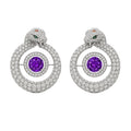Redbutan serpent hoop earrings in pavé-set white diamonds, sculpted snake-head motif with emerald eyes, circular halo design framing a vivid purple round gemstone center, symmetrical pair presented as a museum-grade high-jewelry hero image on clean white background.