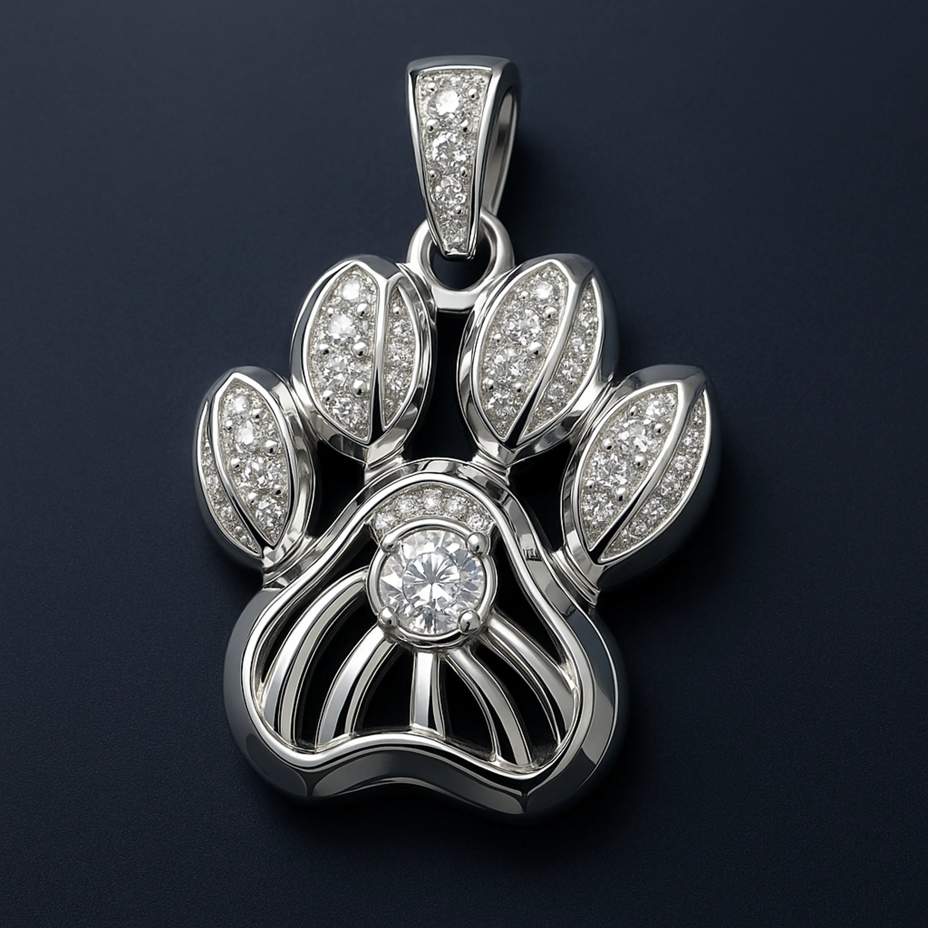 Openwork paw-print pendant in white-gold tone with central round diamond.